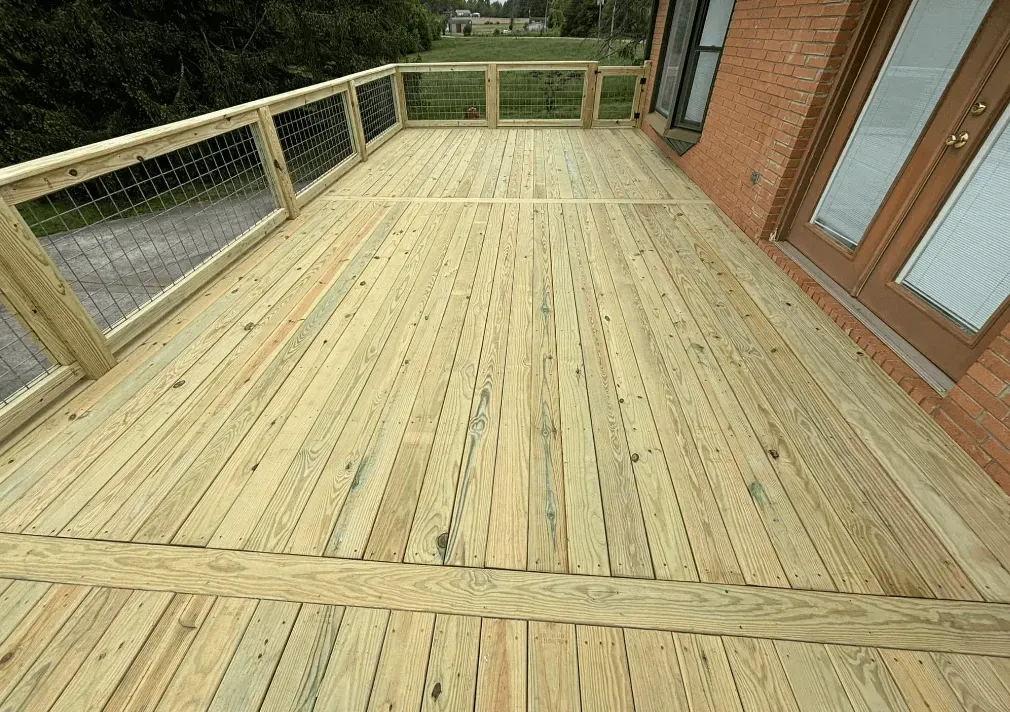 Wood deck with cattle fence railings — Hickory NC custom deck